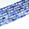 Beads, Lapis (natural), 8-10mm hand-cut smooth Trillion,  C grade, Mohs hardness 5-6. Sold per 14 inches Strand Royal Blue color beads. Lapis lazuli is a deep blue with a touch of purple and flecks of iron pyrite. Lapis consists of Lapis (blue, calcite (white streaks) and silver flakes of pyrite. Deep blue color gemstones are of best kind. 